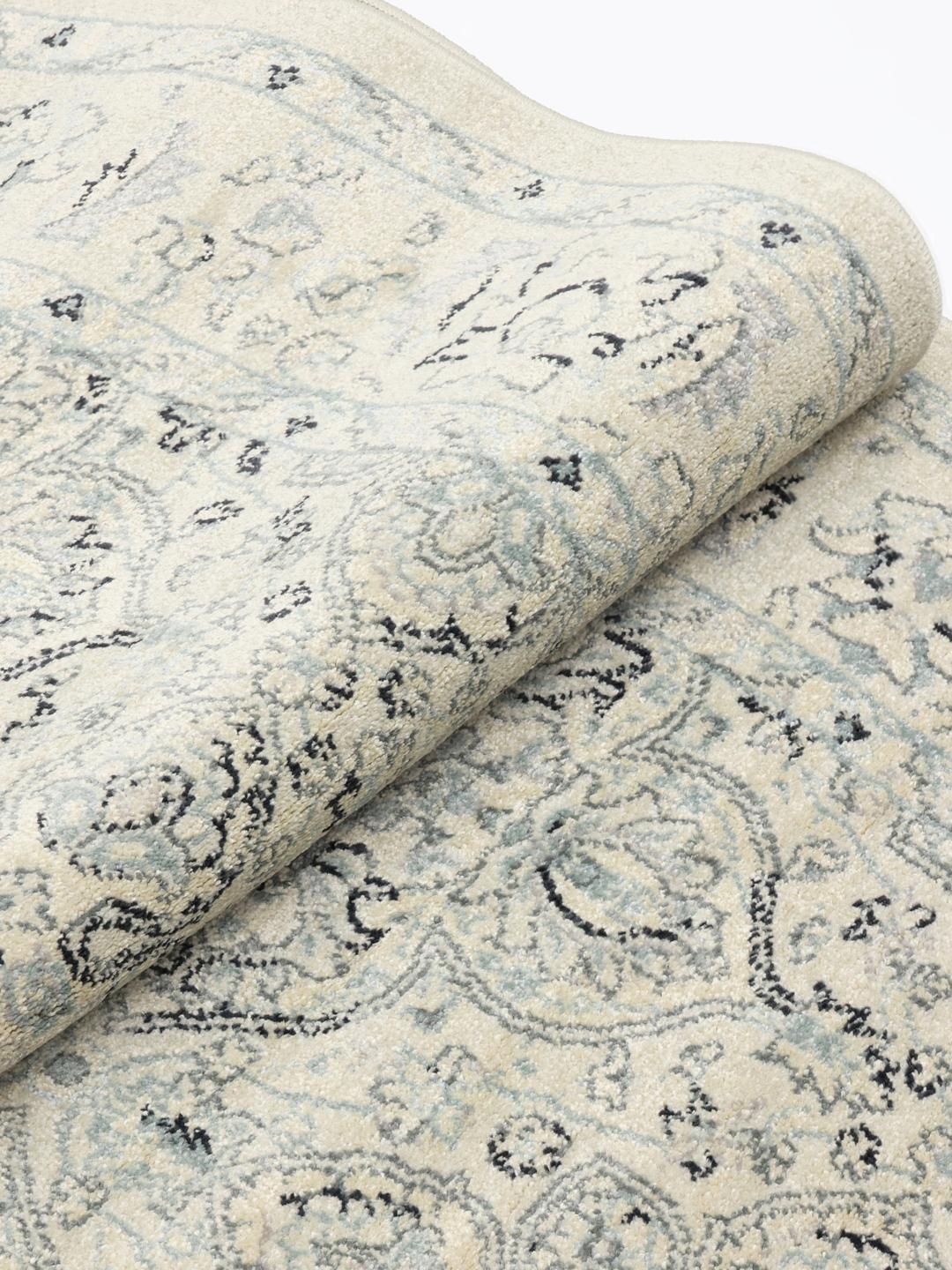 Tapis rond en beige crème et bleu clair