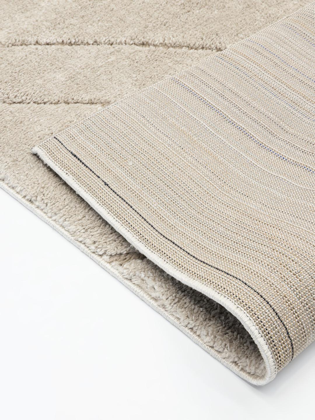 Vierkant beige vloerkleed met een hoog en laagpolige textuur
