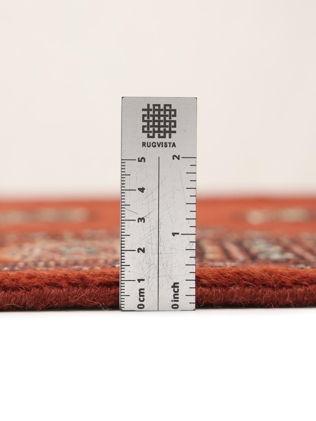Håndknyttet rødt Pakistan Bokhara 2ply tæppe med gentagne geometriske motiver