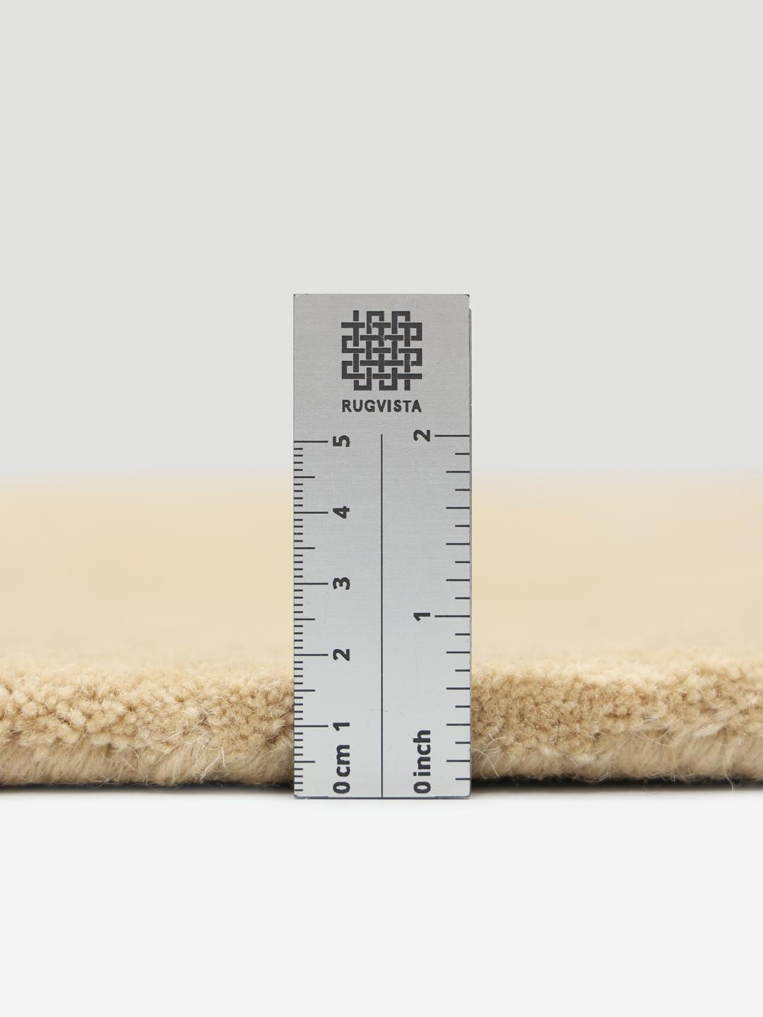 Tapis Beanie beige de forme irrégulière