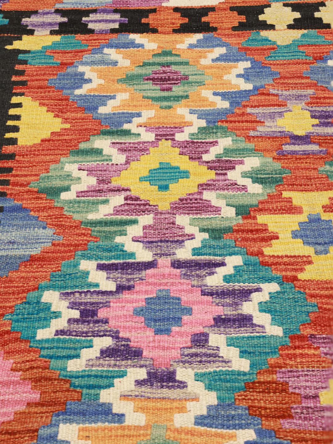Tappeto Kelim afghano tessuto a mano con vivaci motivi geometrici a rombi multicolore
