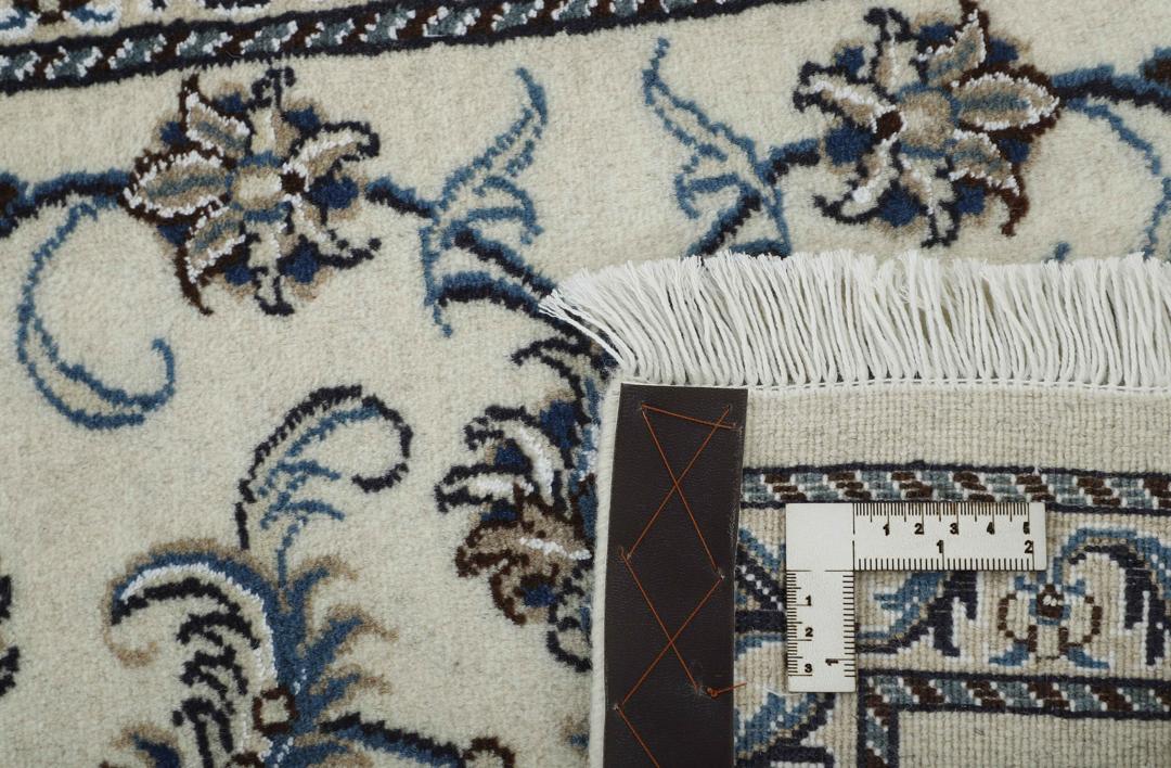 Håndknyttet Nain løber med blomstermønstre i beige og blå fra Mellemøsten