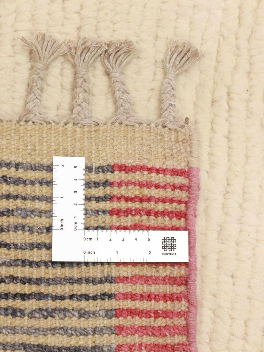 Hand-knotted Middle Eastern rug with Berber style patterns in beige, red, and grey