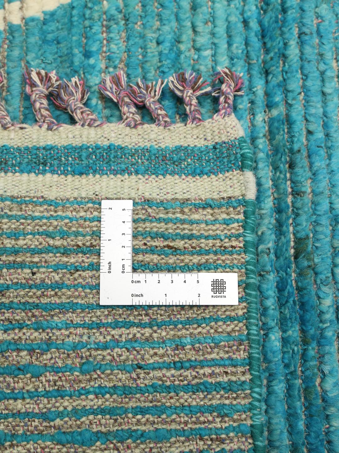 Handgeknoopt teal wollen tapijt uit Afghanistan met een geometrisch patroon