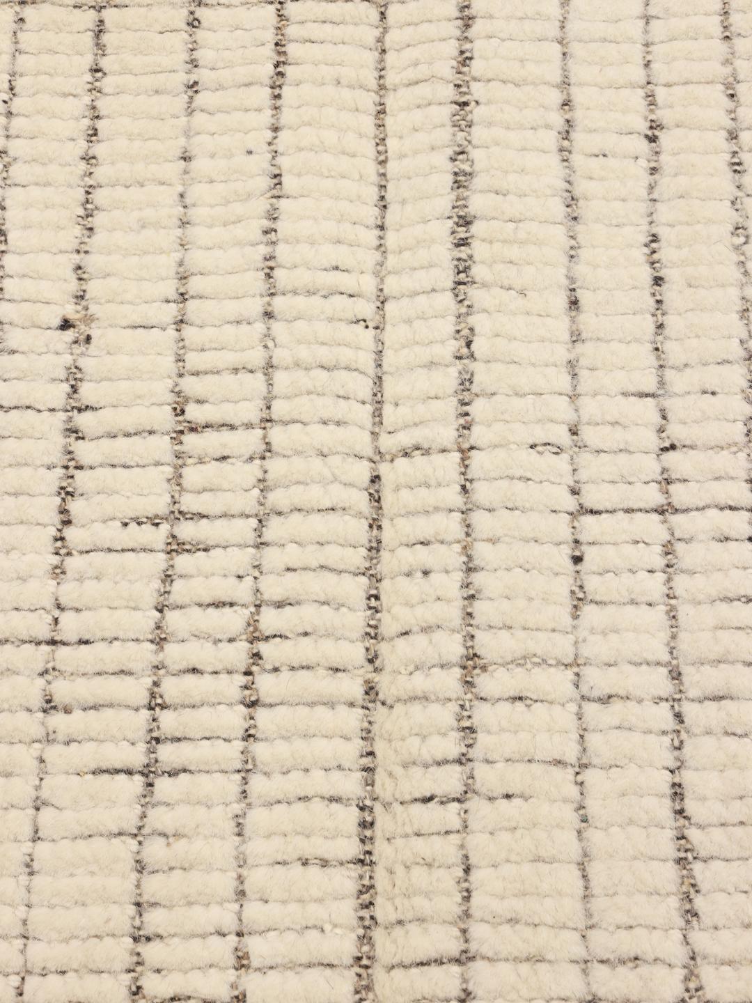 Håndknyttet afghansk tæppe med et minimalistisk ternmønster i beige