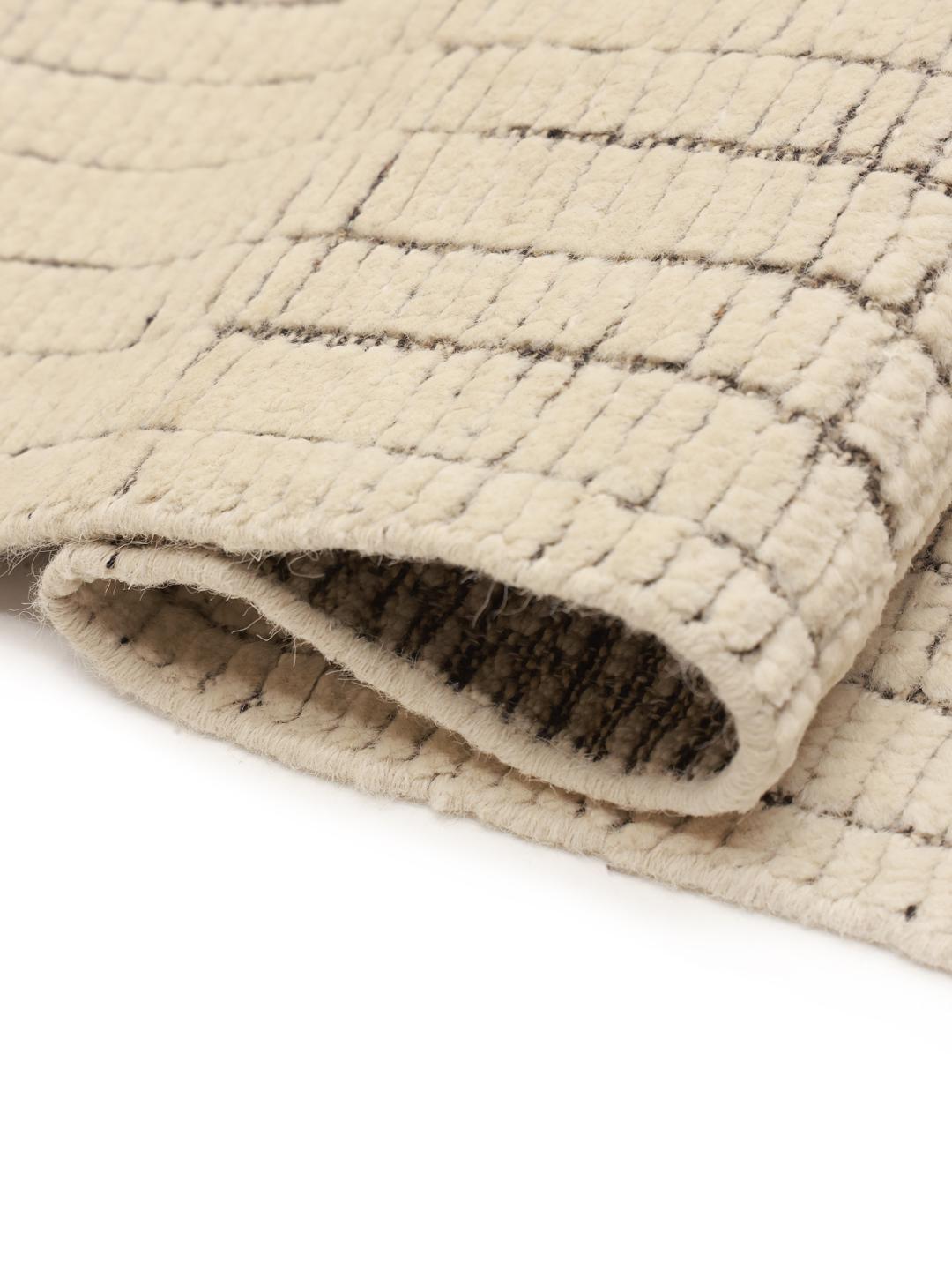 Håndknyttet afghansk tæppe med et minimalistisk ternmønster i beige