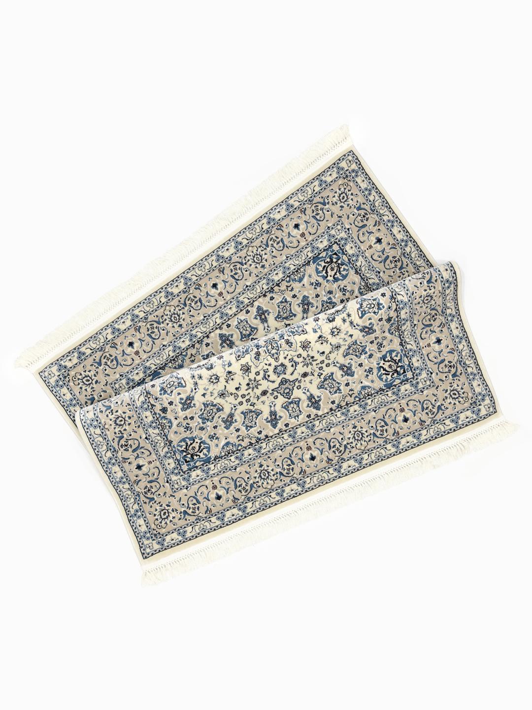 Vierkant tapijt met beige en lichtblauwe bloemmotieven