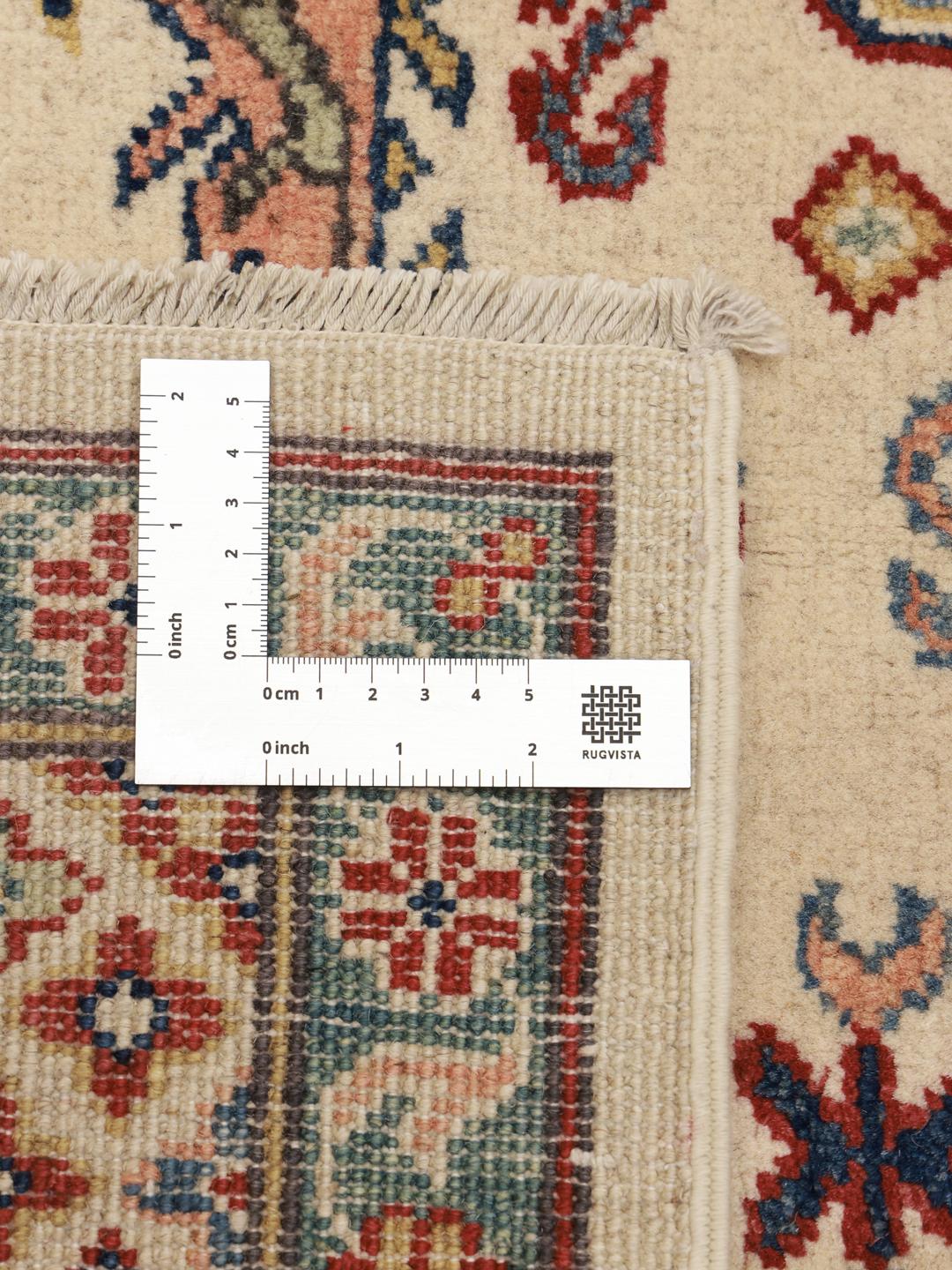 Tapis afghan Kazak noué à la main avec une bordure rouge dynamique et des motifs géométriques