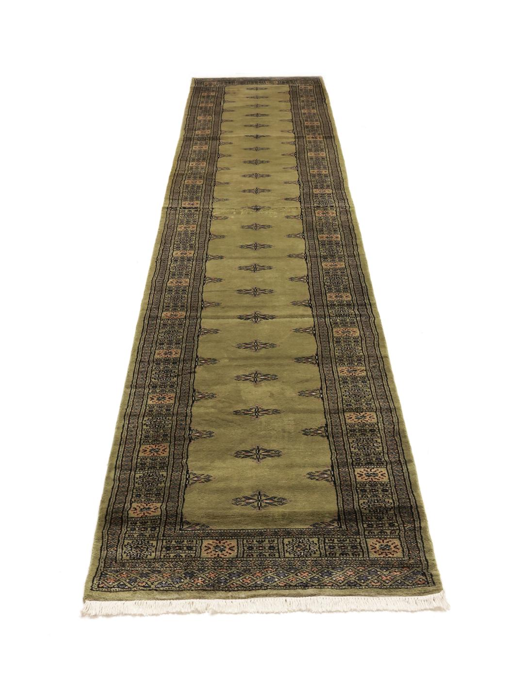 Hand-knotted Pakistan Bokhara runner in green with geometric motifs