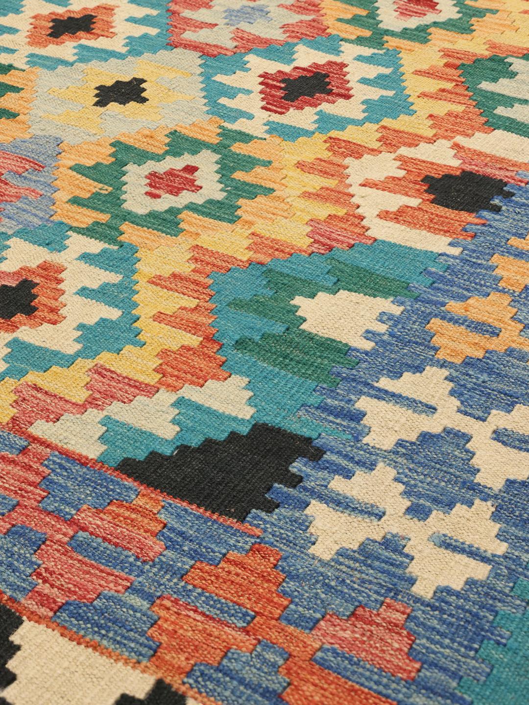 Tapis Kelim afghan tissé à la main avec un motif géométrique multicolore en losanges