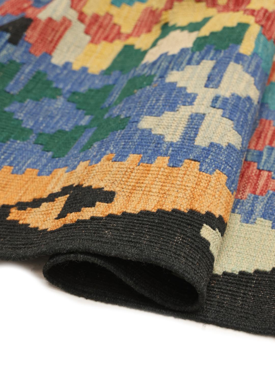 Tapis Kelim afghan tissé à la main avec un motif géométrique multicolore en losanges