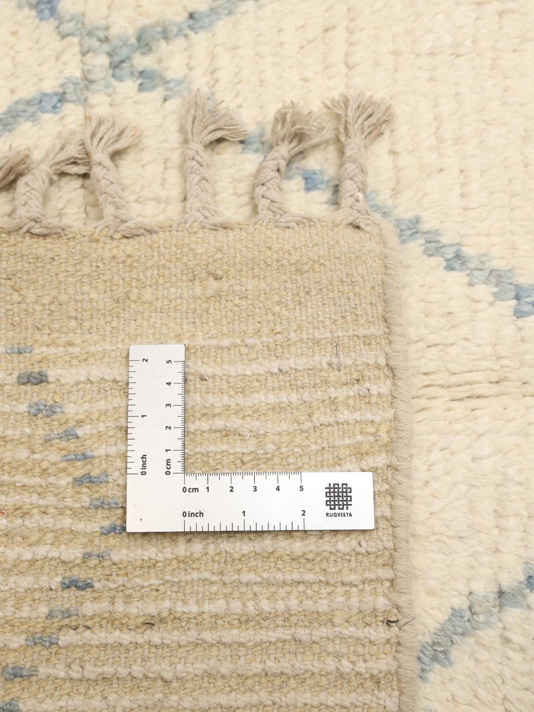 Handgeknoopt Afghaans tapijt met ruitpatroon in beige en blauw