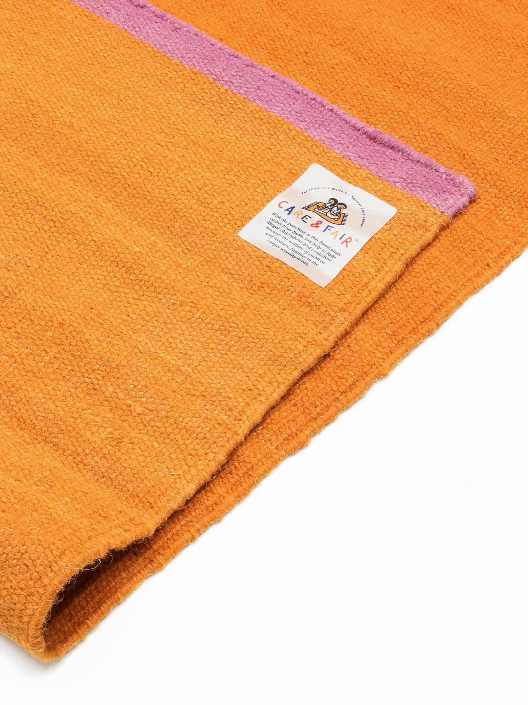 Handgeweven oranje loper met roze randen