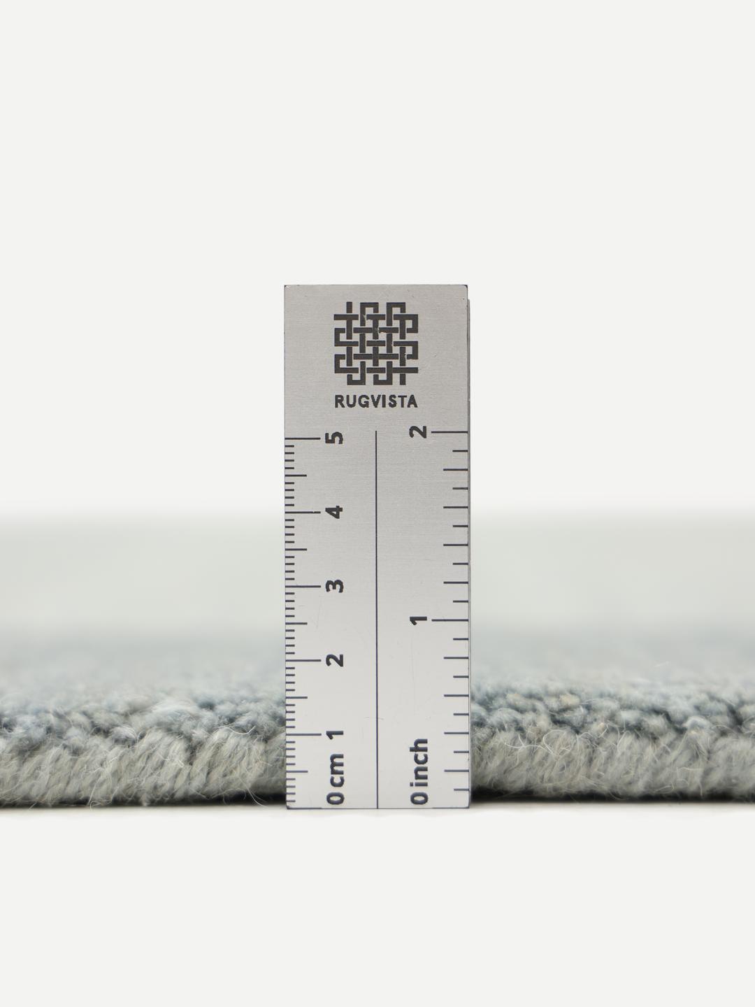 Handloom Frame tæppe i støvblå
