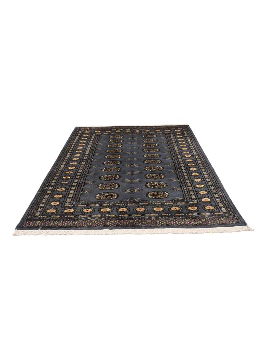 A hand-knotted Pakistan Bokhara rug in grey with traditional medallion motifs.