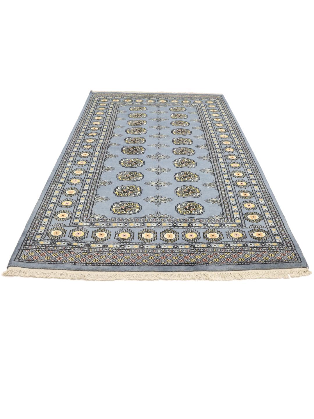 Hand-knotted Pakistan Bokhara 2ply rug in blue with traditional geometric motifs.