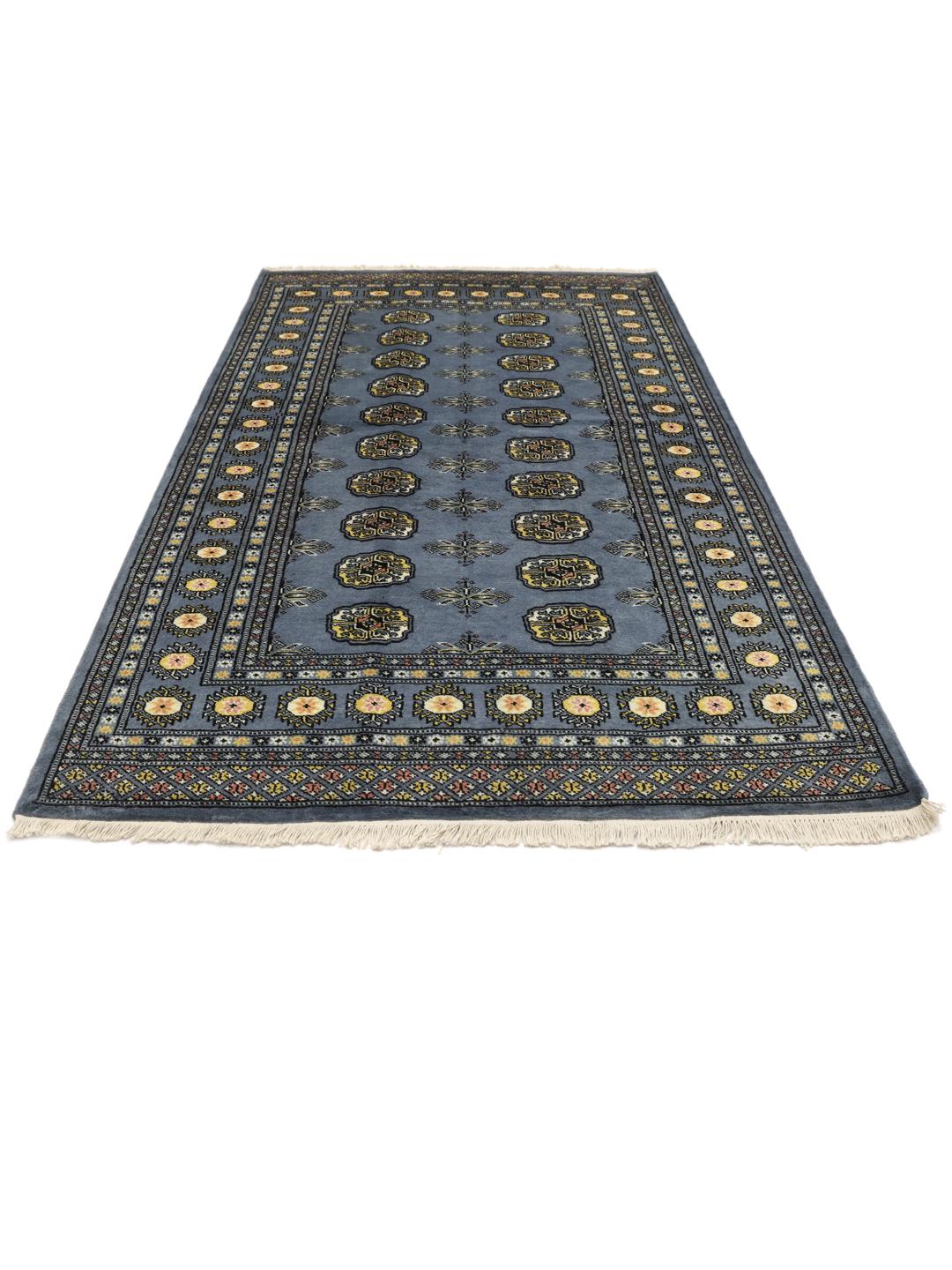 Hand-knotted Pakistan Bokhara 2ply rug in blue with traditional geometric motifs.