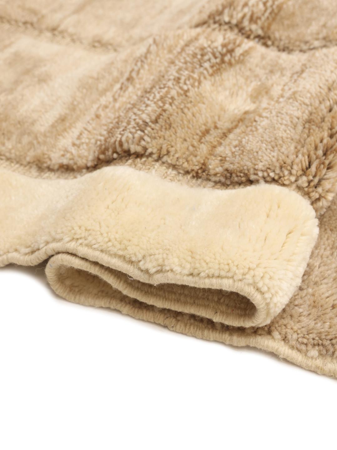 Handgeknoopt Marokkaans Berber-tapijt met artistieke geometrische patronen in beige en bruine wol