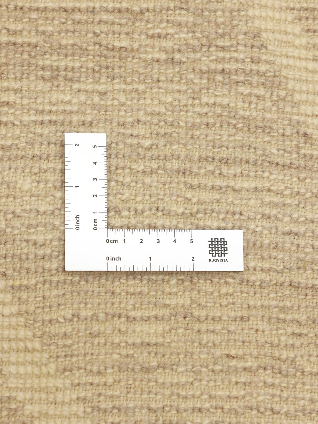 Een handgeknoopt Berber Marokkaans tapijt in beige met een ruitpatroon