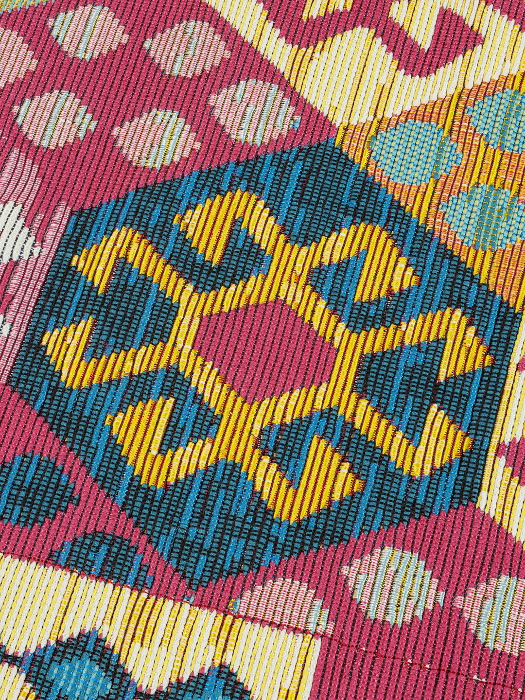 Multicolour vloerkleed met een geometrisch Kilim patroon.