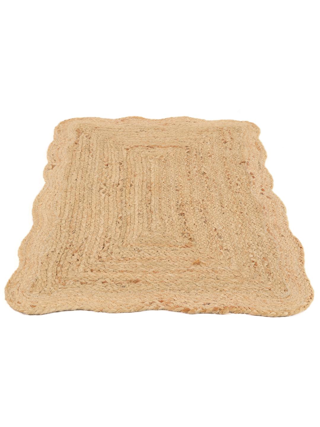 Beige vloerkleed met een golvende rand