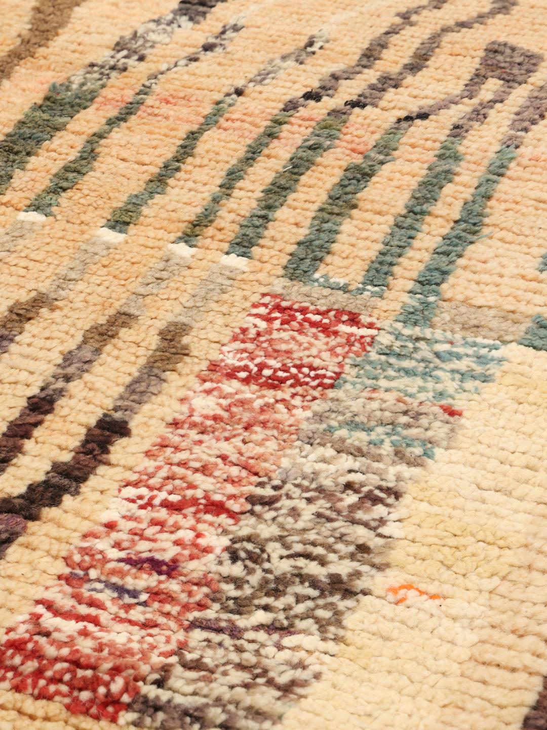 Moroccan rug in beige with unique tribal patterns