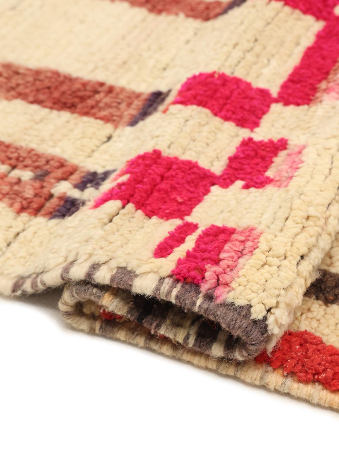 Moroccan rug in beige with unique tribal patterns