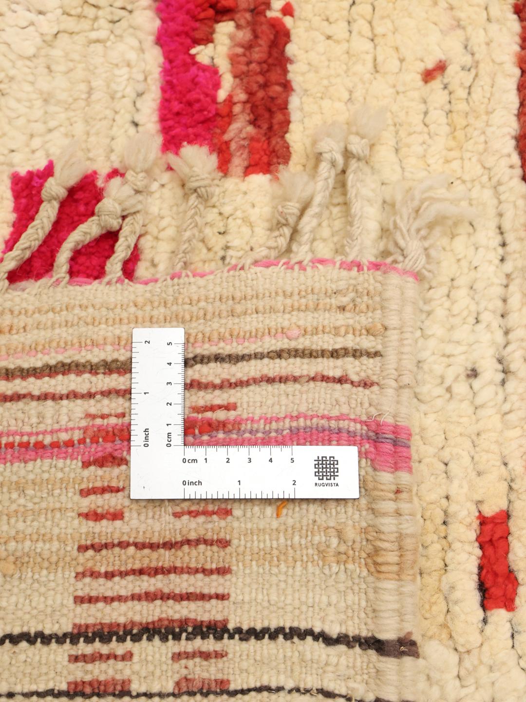 Moroccan rug in beige with unique tribal patterns