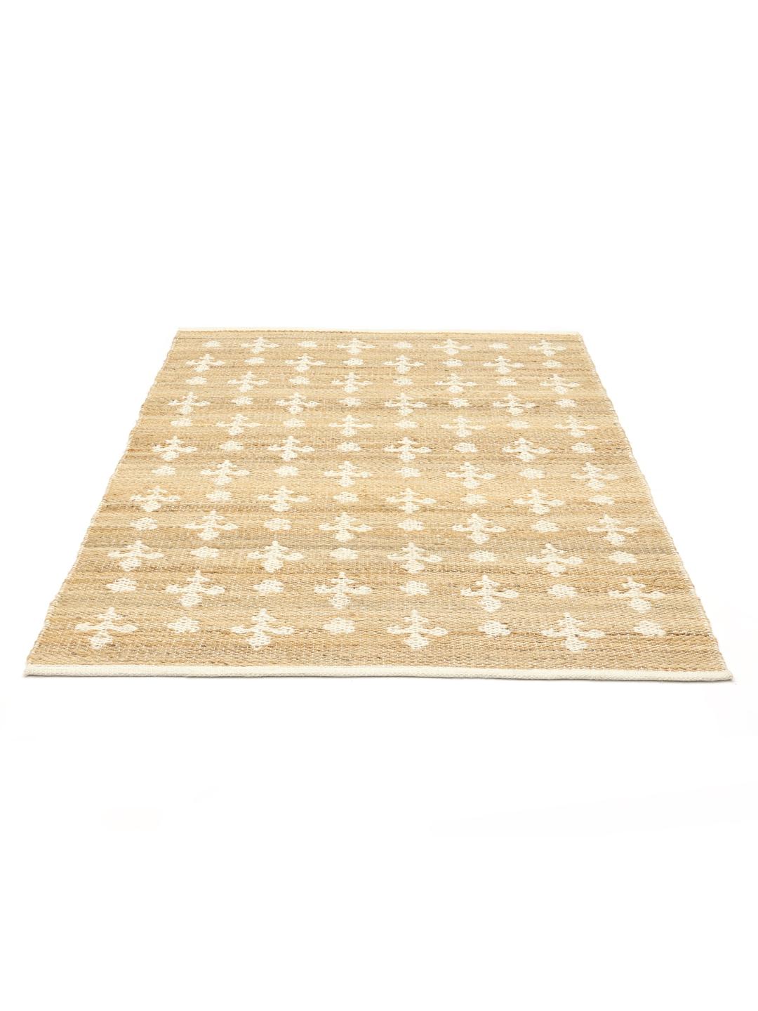 Beige vloerkleed met natuurlijke geweven textuur