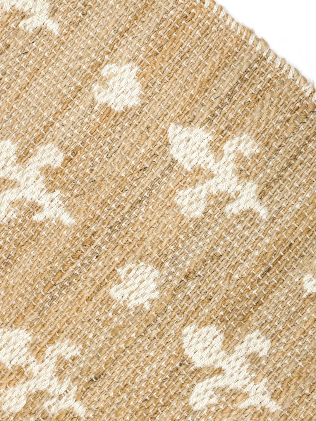 Beige vloerkleed met natuurlijke geweven textuur