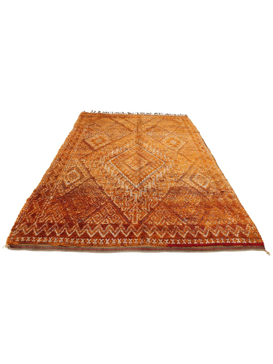 Vintage berber marokkansk tæppe med geometriske diamantmønstre i orange og brune nuancer