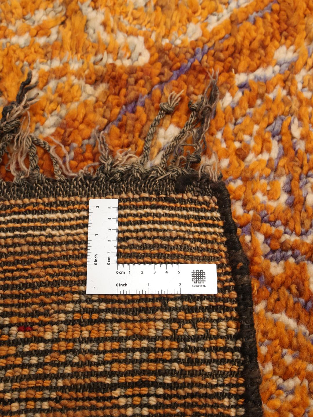 Vintage berber marokkansk tæppe med geometriske diamantmønstre i orange og brune nuancer