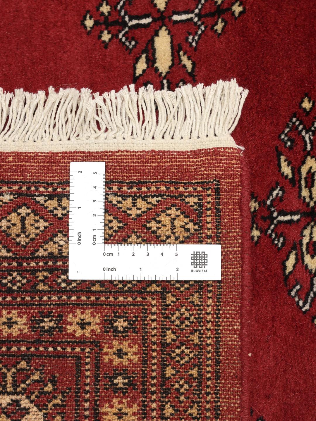 Handgeknoopt donkerrood Bokhara tapijt uit Pakistan met geometrische motieven