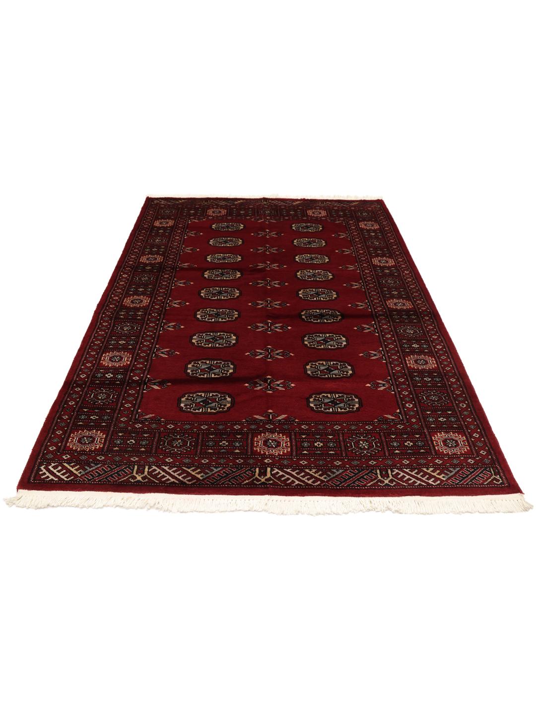 Hand-knotted Pakistani Bokhara rug in dark-red with traditional repeating motifs