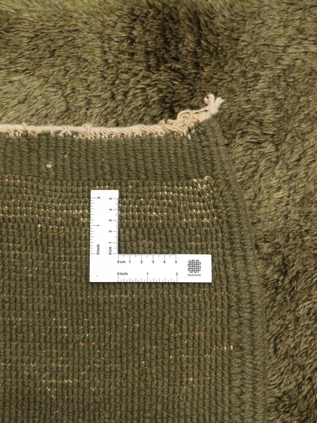 Tapis berbère Beni Ouarain noué à la main en vert avec des motifs géométriques