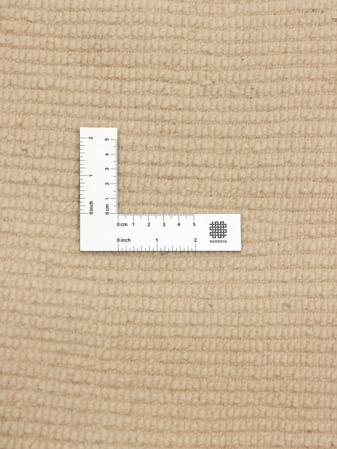 Tapis marocain carré noué à la main dans un ton beige naturel