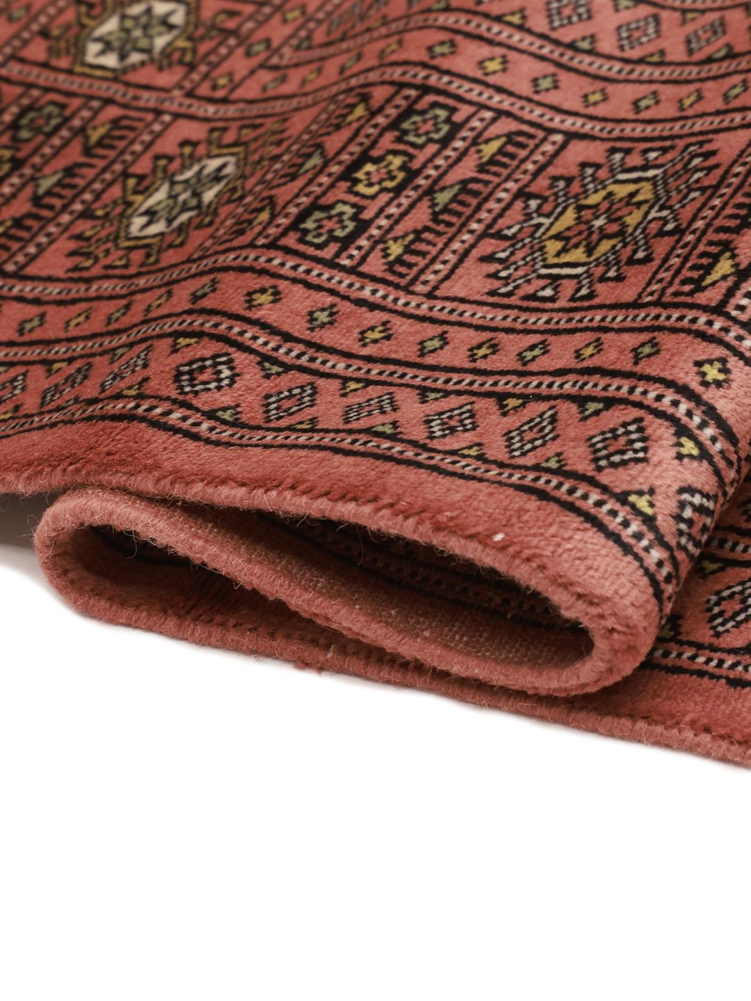Hand-knotted Pakistani Bokhara rug in dark-red with geometric medallions