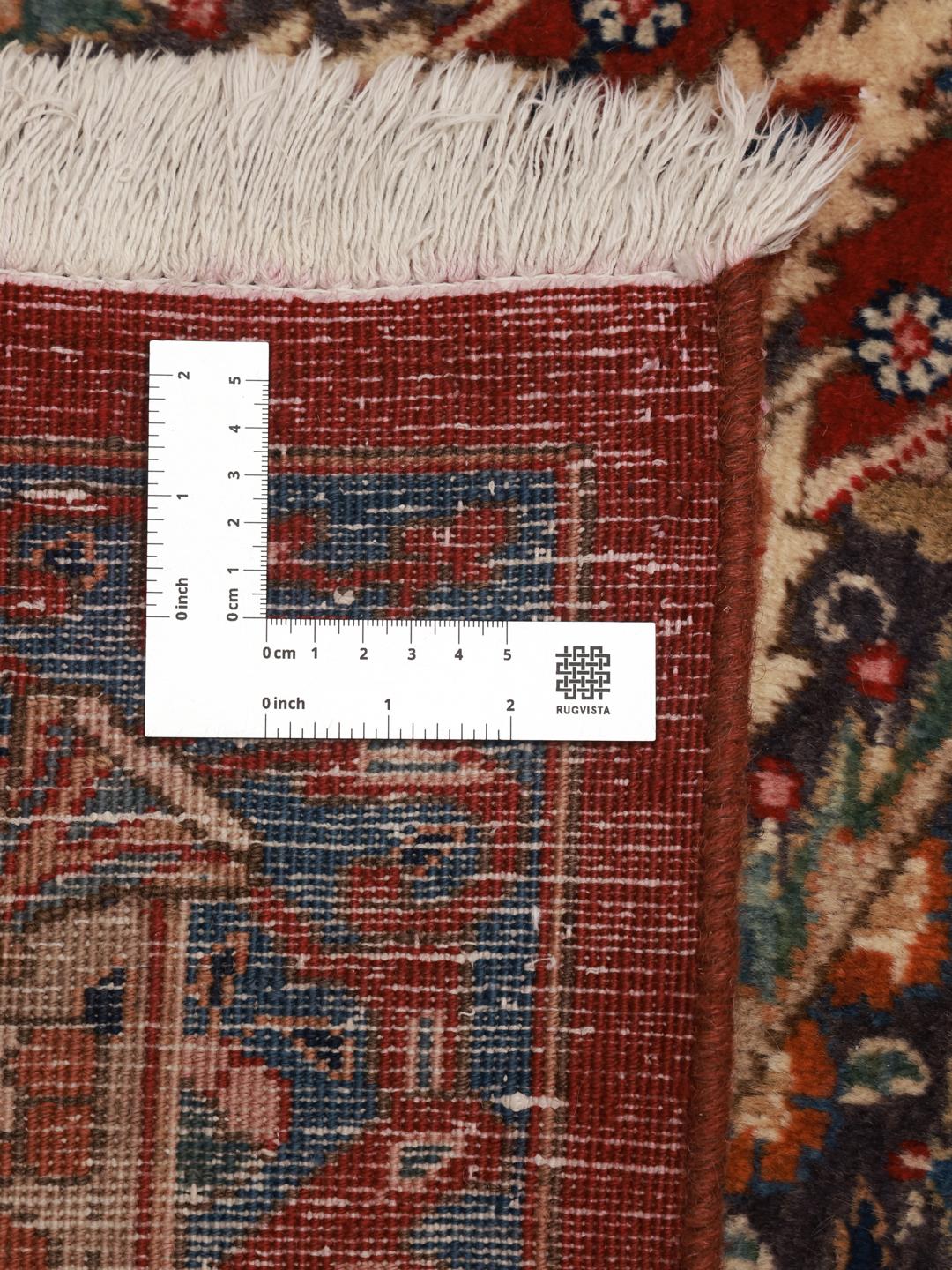 Handgeknoopt Mashad-tapijt uit het Midden-Oosten in dieprode en blauwe tinten