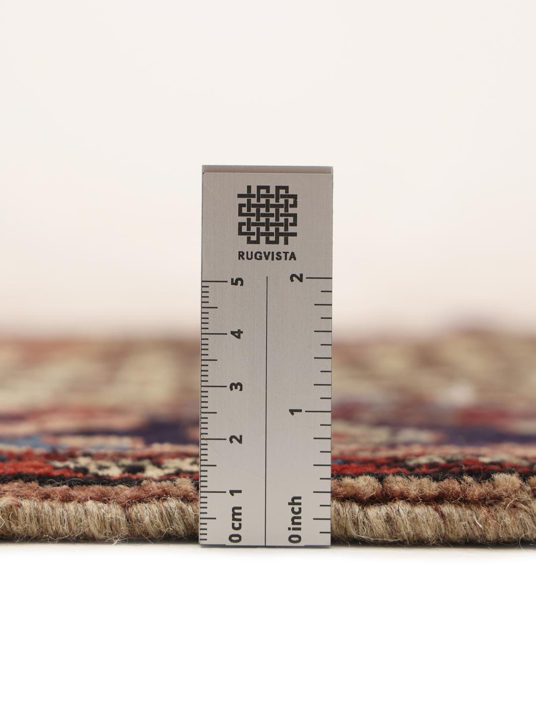 Handgeknoopt Koliai-tapijt uit het Midden-Oosten in meerkleurige wol