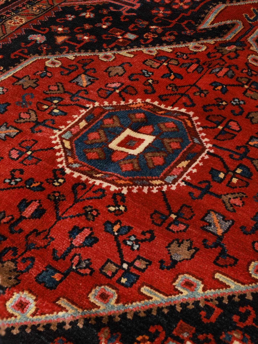Hand-knotted Hamadan rug from the Middle East in dark-red and blue tones