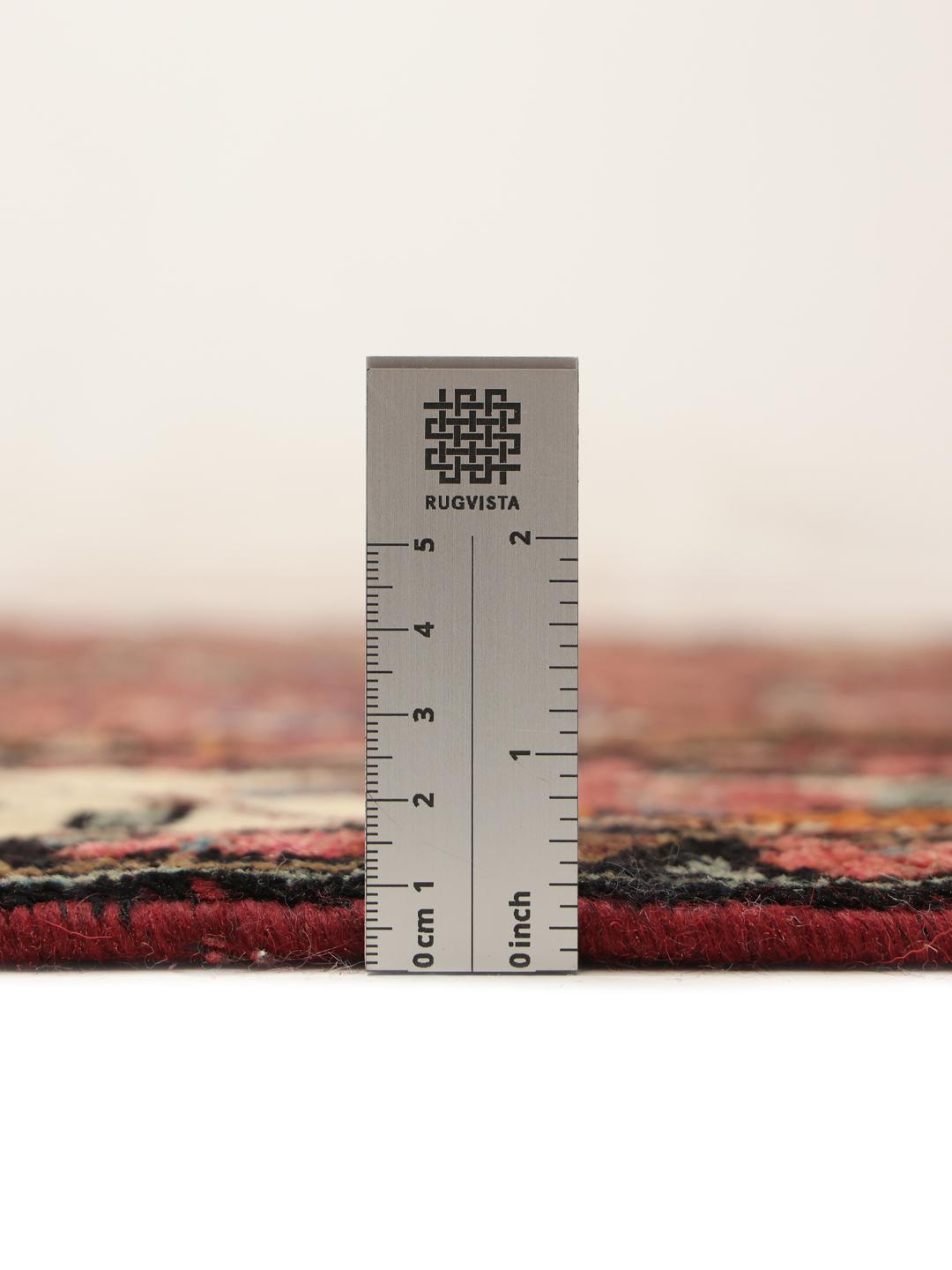 Hand-knotted Hamadan rug from the Middle East in red with a central medallion