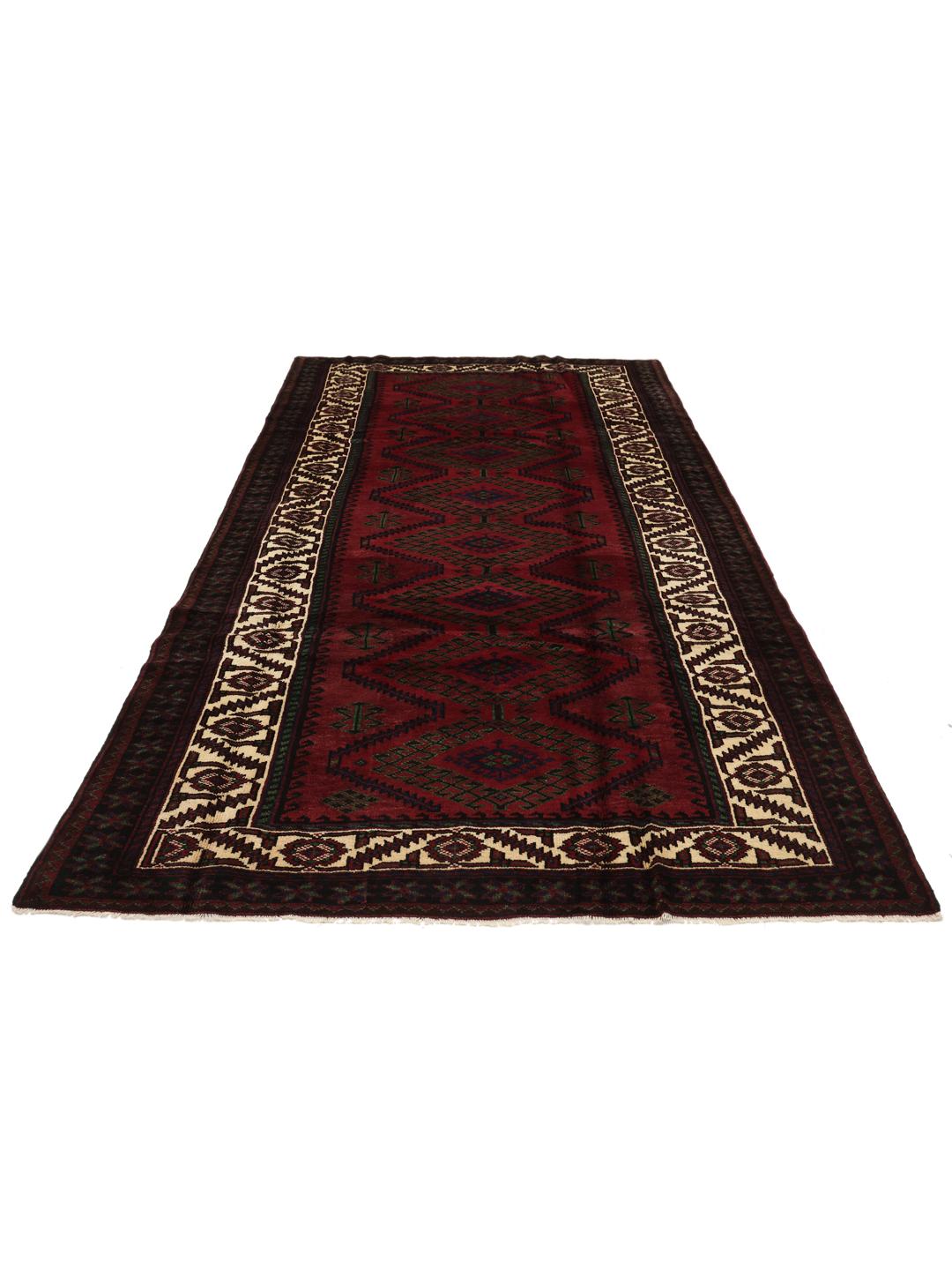 Handmade Lori rug from the Middle East with a deep red field and geometric motifs