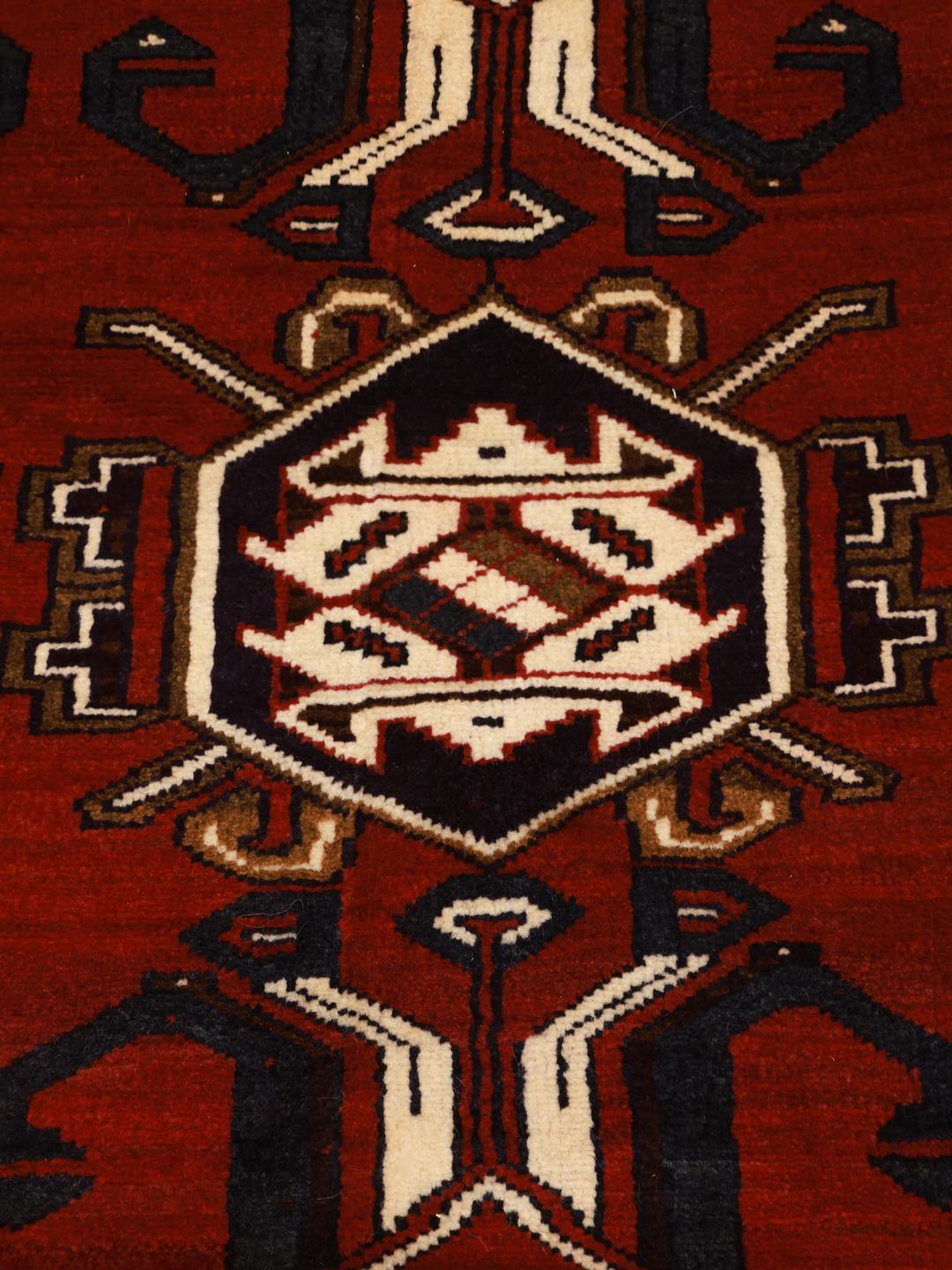 Håndknyttet Lori-tæppe fra Mellemøsten i dyb rød med geometriske mønstre