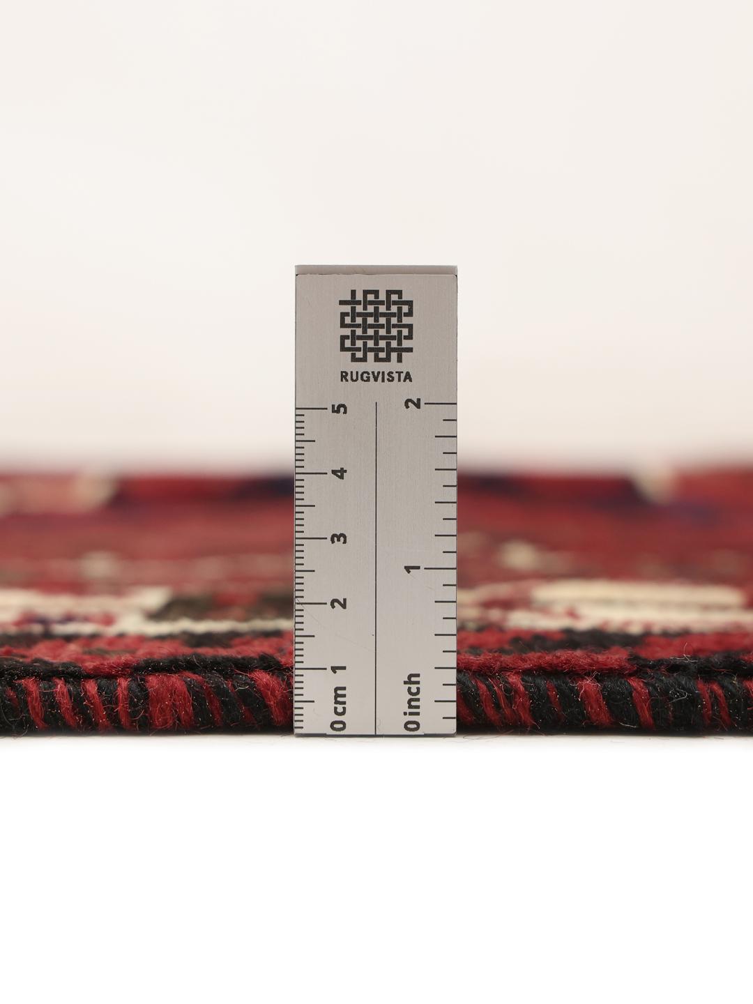 Hand-knotted Lori rug from the Middle East in dark-red tones