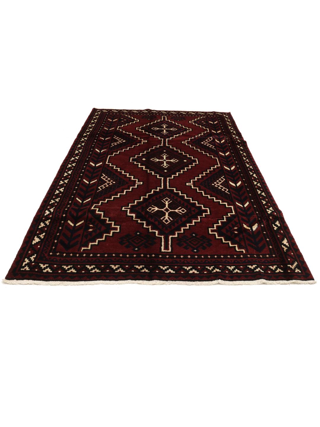 A unique hand-knotted Lori rug from the Middle East in dark-red with geometric patterns.