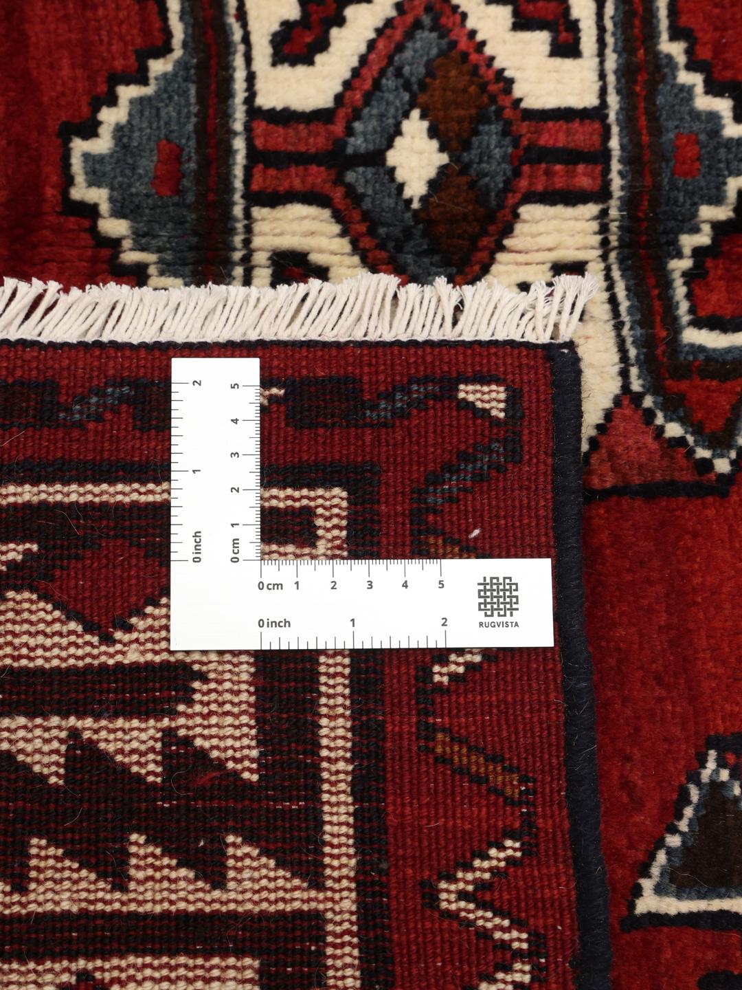 Hand-knotted Lori rug from the Middle East in dark red and black tones