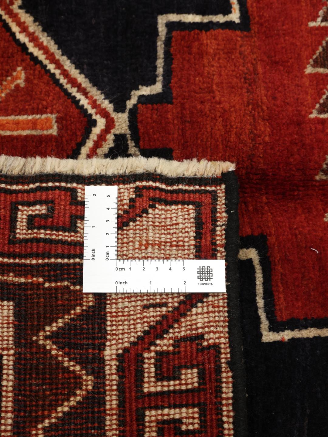 Håndknyttet Lori-tæppe fra Mellemøsten med et rødt og sort geometrisk design