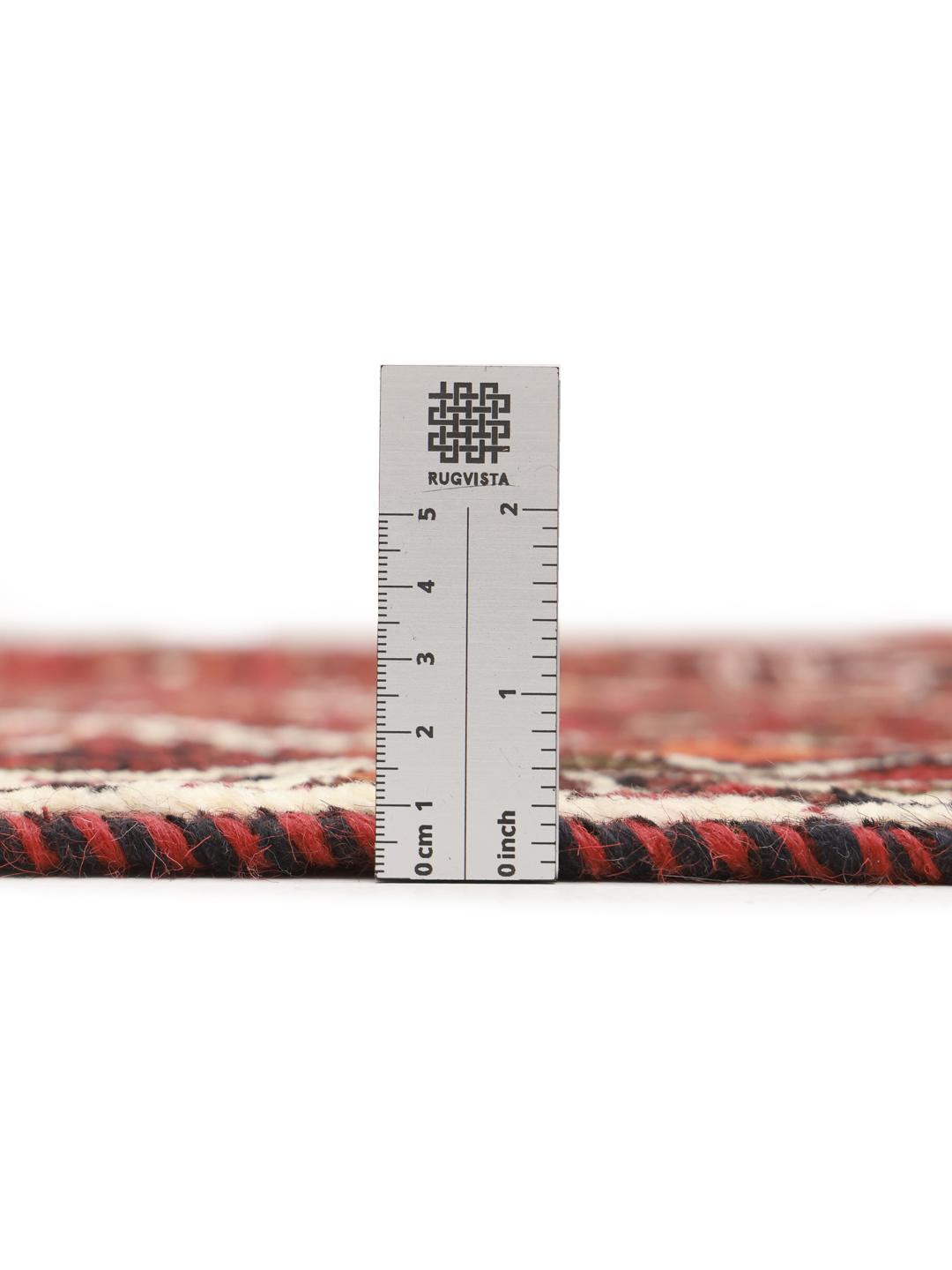 Hand-knotted red Shiraz rug with geometric tribal patterns from the Middle East