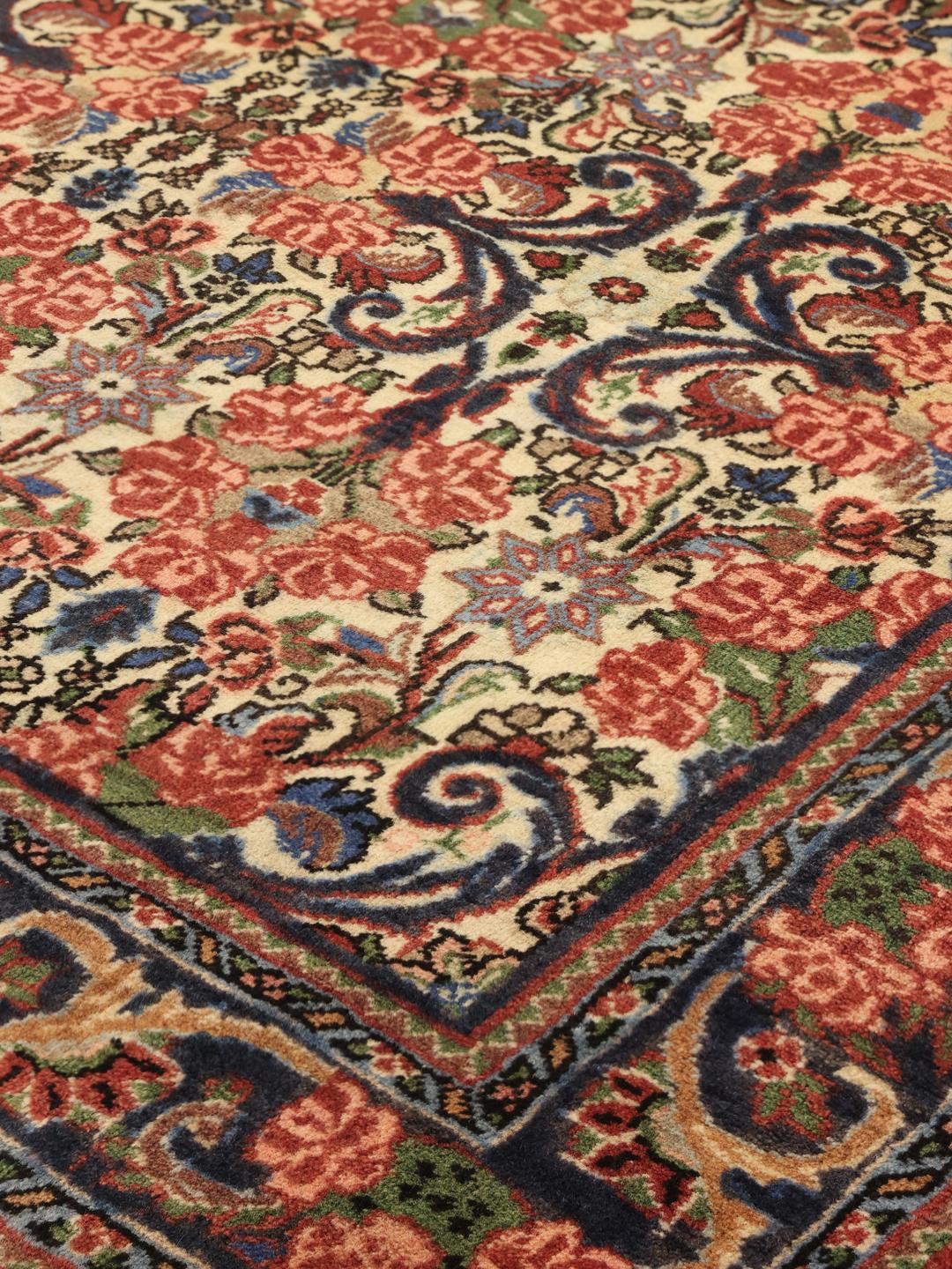 Handgeknoopt Bidjar-tapijt met bloemmotieven in multicolor