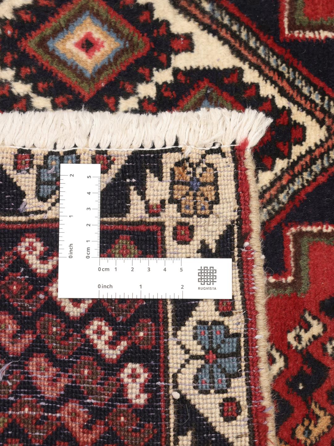 Hand-knotted Afshar Shahre Babak rug with red and dark-blue geometric patterns